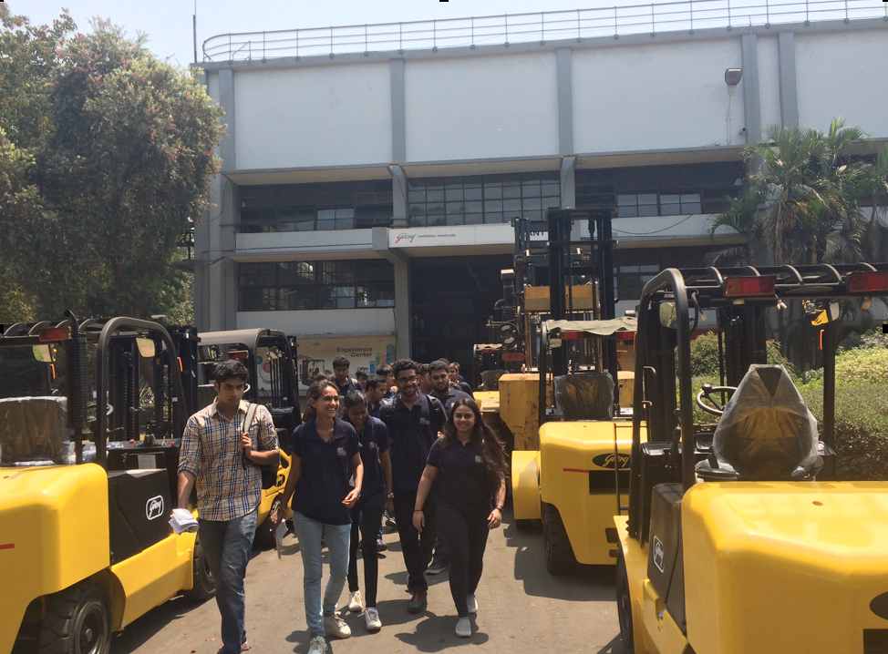 Jags tour the forklift area at Godrej & Boyce's plant near Mumbai